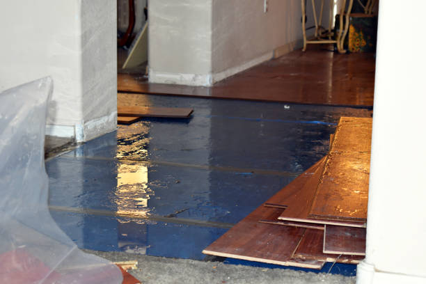 Professional Water Damage Restoration technician working in Latham, NY
